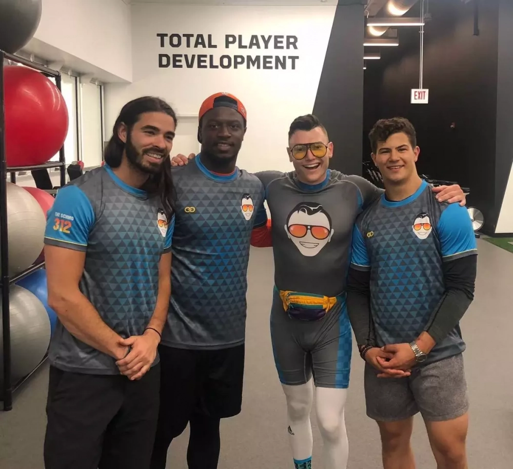 The Schmo and others wearing custom compression apparel from Wooter Apparel.