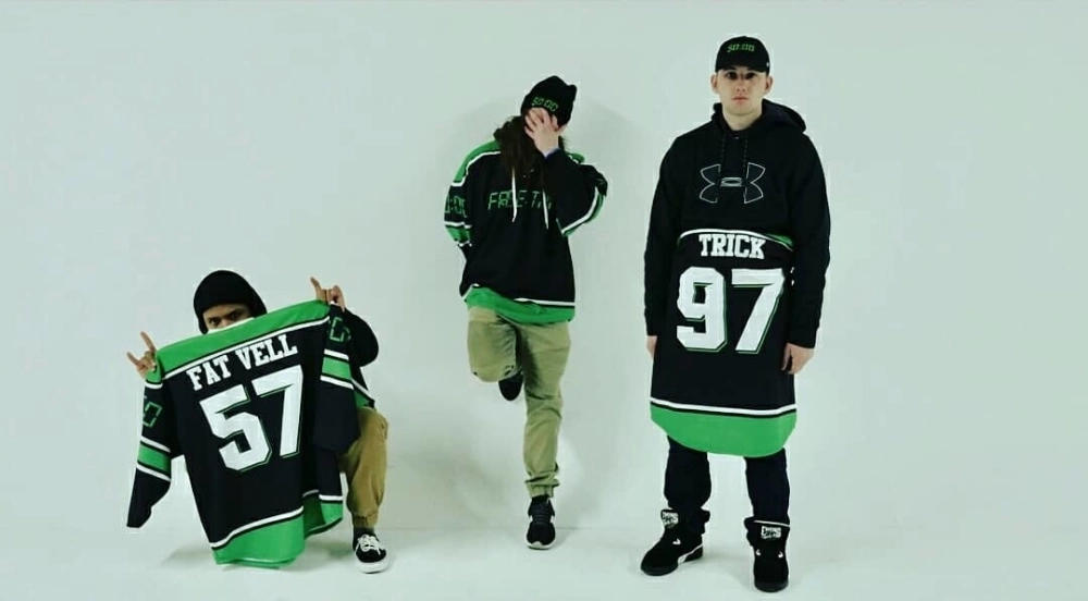 custom black green and white ice hockey uniforms