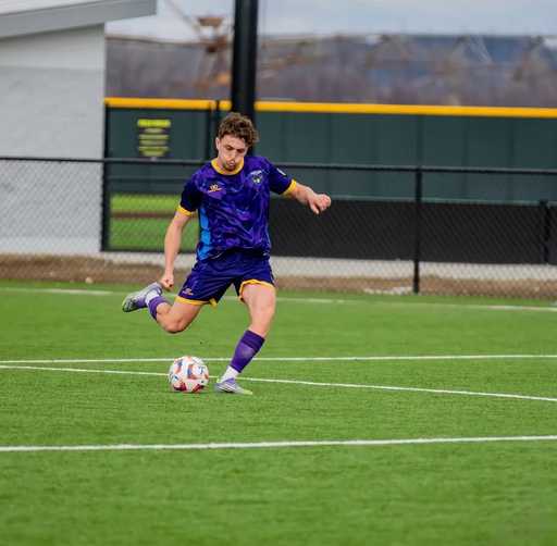 Player wearing purple custom reversible soccer jersey crew neck design