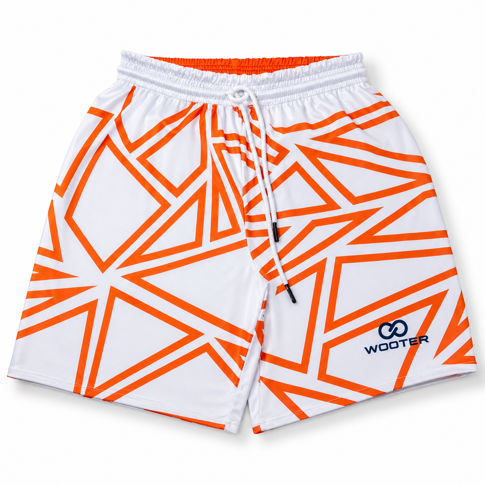 White and orange custom reversible soccer shorts with geometric print