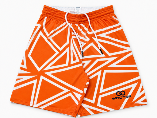 Orange custom reversible soccer shorts with white geometric design