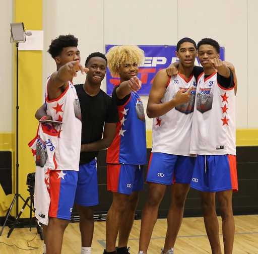 Players wearing custom basketball practice jerseys on court