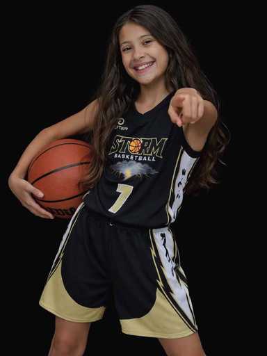Female basketball player wearing black custom athletic shorts with jersey