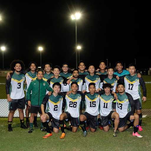 Team photo in light blue custom v-neck soccer jerseys at night