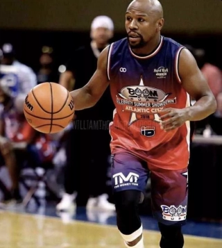 Player Wearing Boom purple and red Custom Round Neck Basketball Jerseys
