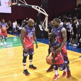 Player Wearing Boom purple and red Custom Round Neck Basketball Jerseys