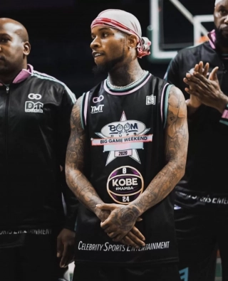 Player Wearing Boom purple and red Custom Round Neck Basketball Jerseys