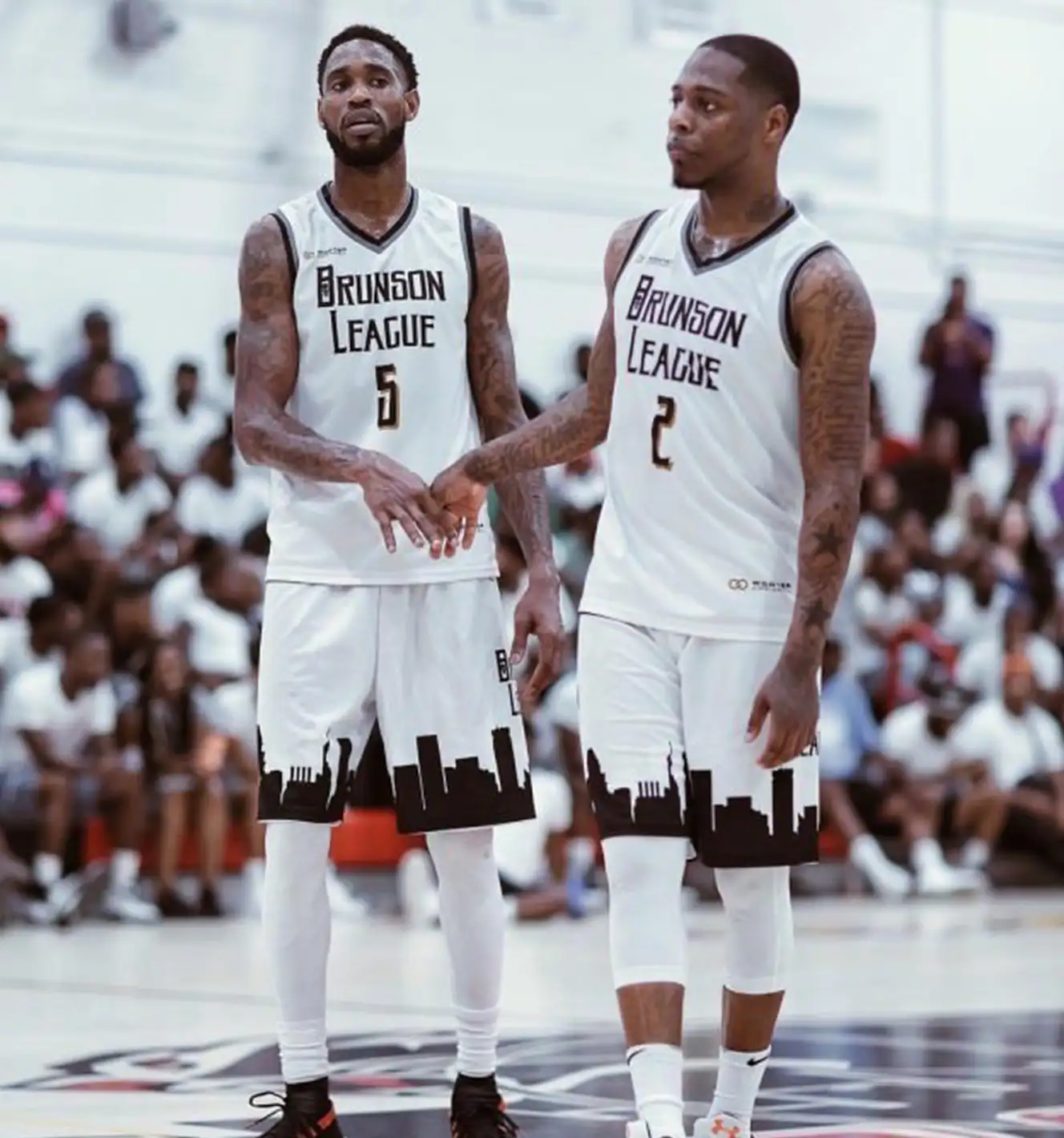 Players wearing Brunson League brown and White Custom Basketball Jersey