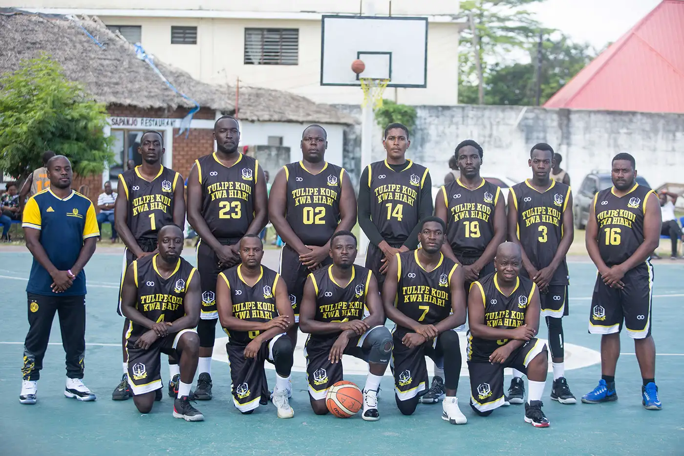 Team Tulip Kodikwa wearing Wooter Custom V-Neck Basketball Jerseys