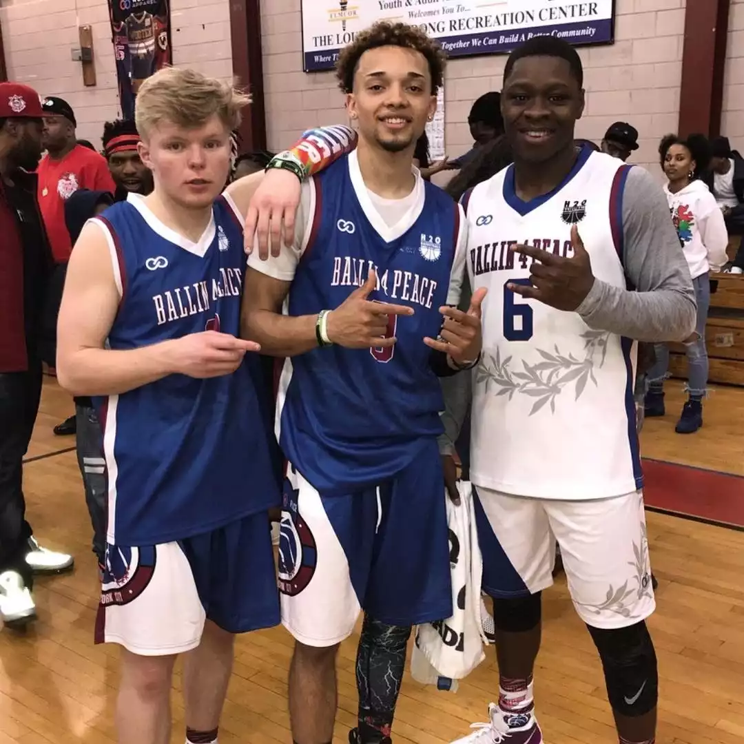 Players wearing Wooter Custom navy and white Basketball Shorts