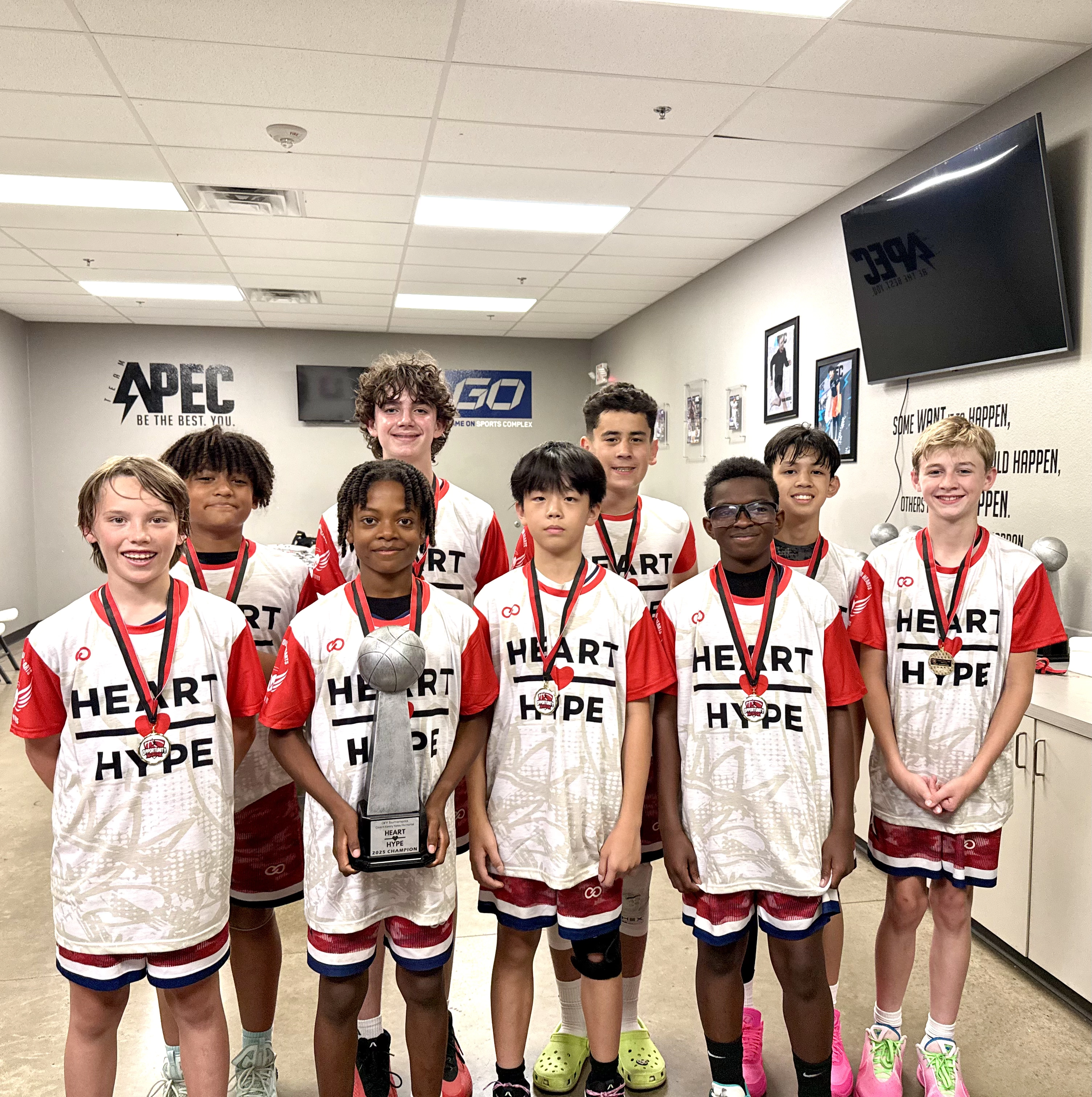 players wearing Heart Hype white and orange Custom Short Sleeve Crew Neck Basketball Jerseys