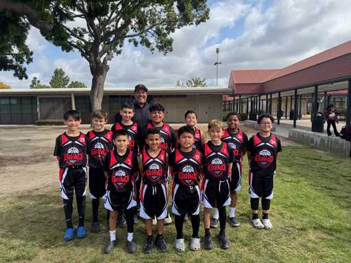 Players wearing GRIND Black and Red Custom Basketball Jersey