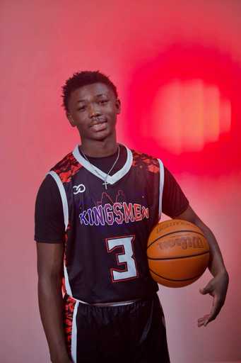 Players wearing Kingsmen black and red Custom Basketball Jersey
